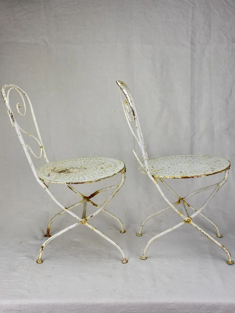 Pair of early 20th Century French children's folding garden chairs - white