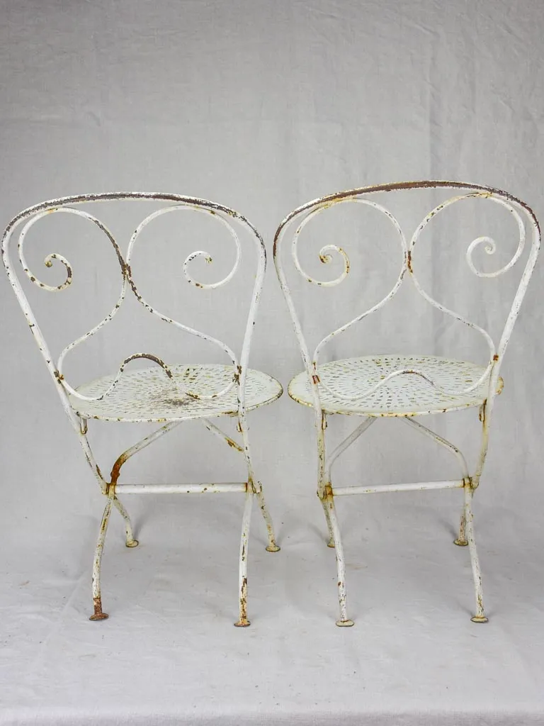 Pair of early 20th Century French children's folding garden chairs - white